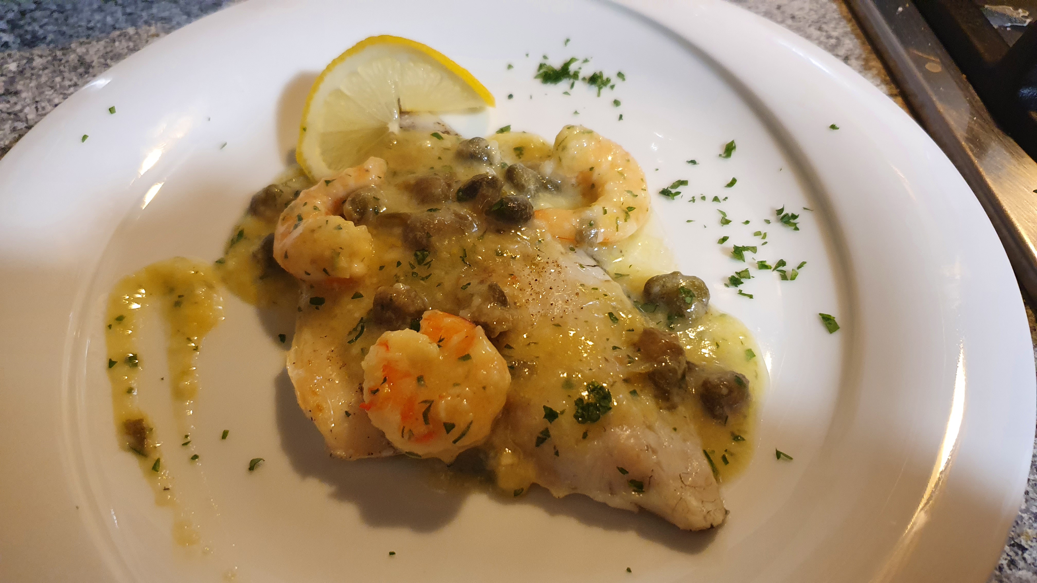 Filetto di orata e gamberi al limone