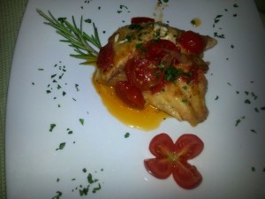 Scaloppine di orata con cipollotti e pomodorini